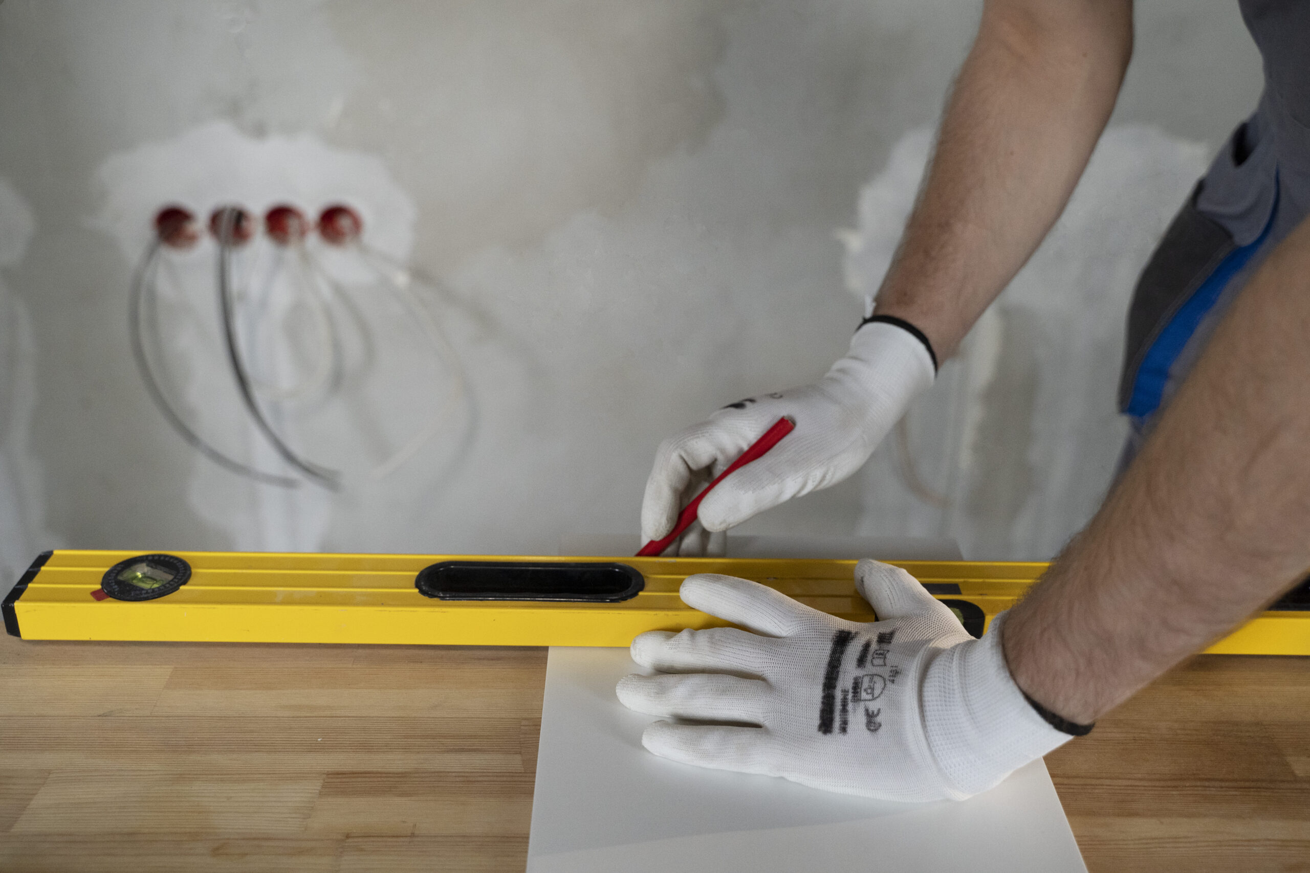 tiler working renovation apartment min scaled